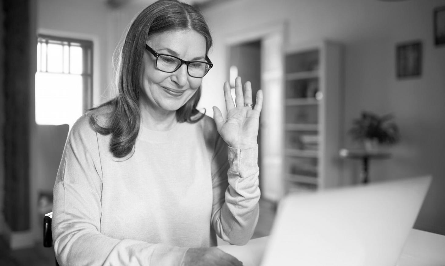 Remote learner working on budget planning at home workspace